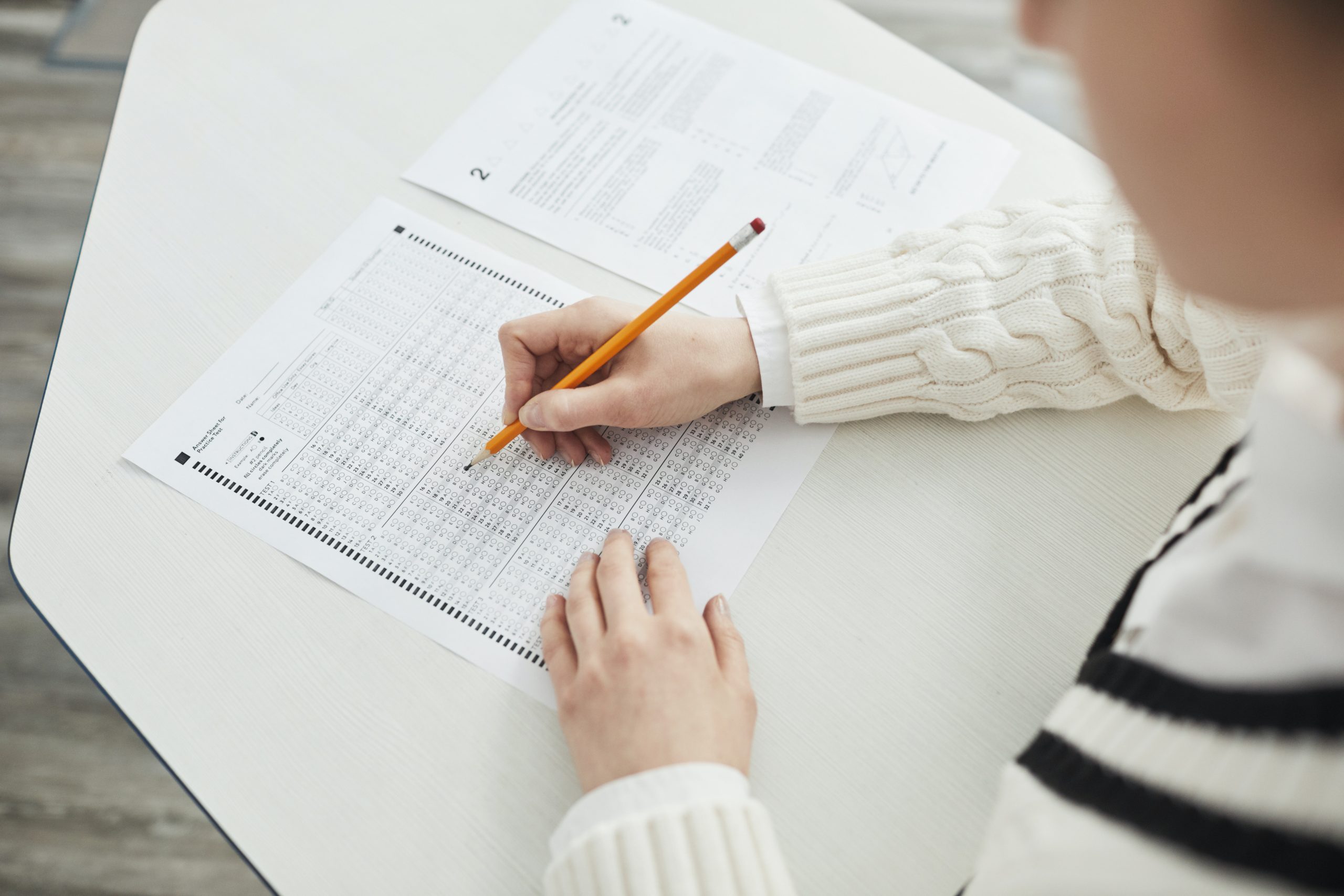 student taking a multiple choice exam