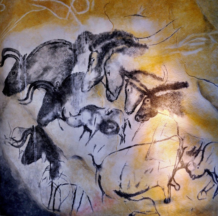photo of cave art: animals include aurocks, rhinos, and horses