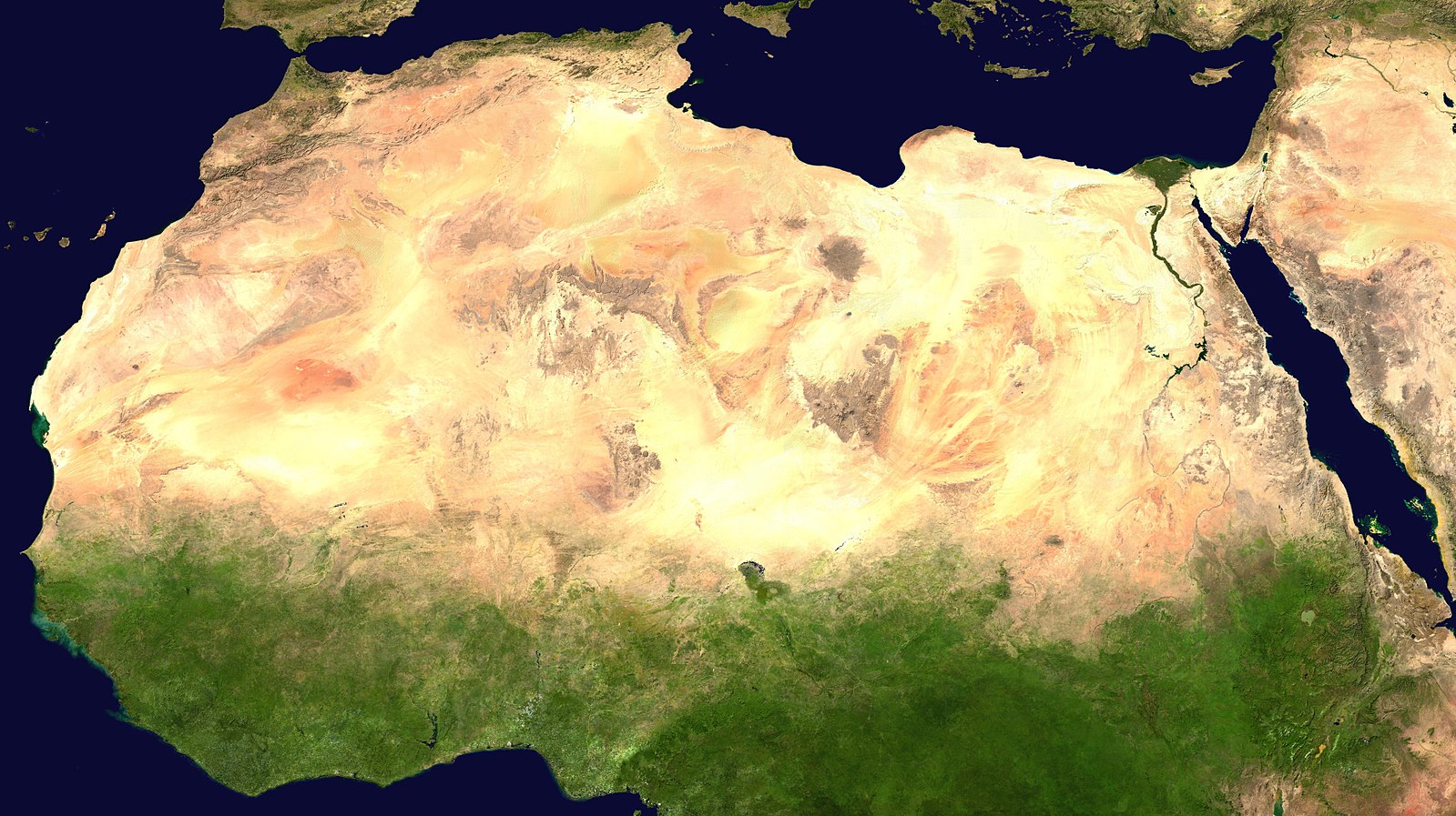 North and Central Africa taken from space showing much of the north is desert, with greener regions father south. Nile valley and few parts of the Mediterranean Coast also has some vegetation.