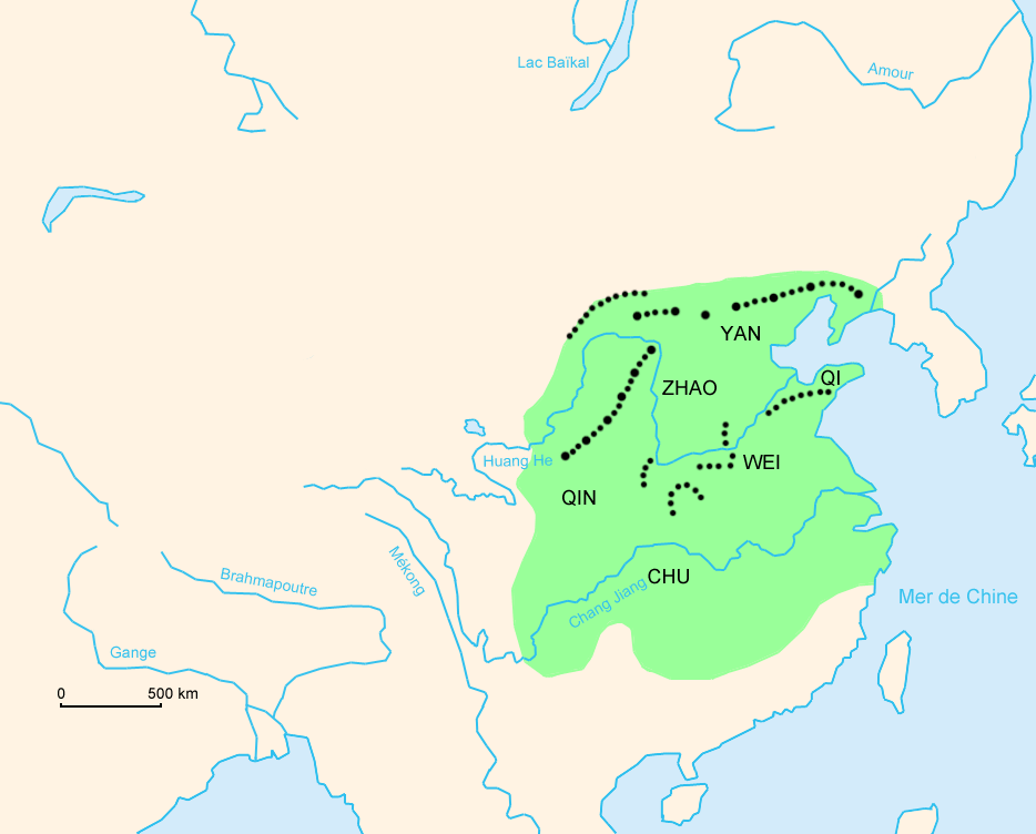 Map of China with green shading showing state borders, and dots indicating the range of the Great Wall during two different historical periods