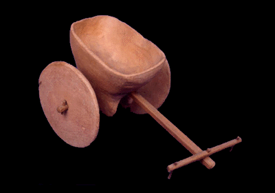 Photo of a wheeled cart made of clay