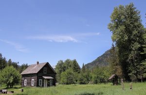 The Bull River Guard Station was built in 1908 as the Ranger's house and office. This structure was a primary ranger station from 1908 to 1920, surviving the 1910 fire. The cabin was home to Granville "Granny" Gordon (District Ranger), his wife and three daughters. When the 1910 fires roared thru the country, Mrs. Gordon prepared for the worst by soaking gunny sacks in a tub of water. If they had to escape the fire, they would wrap themselves in the gunny sacks and race to the Bull River to wait out the fire. As the fire closed in on the ranger station, it shifted direction and swept up Pilik ridge sparing their home. The cabin is a two story building, containing 700 square feet.