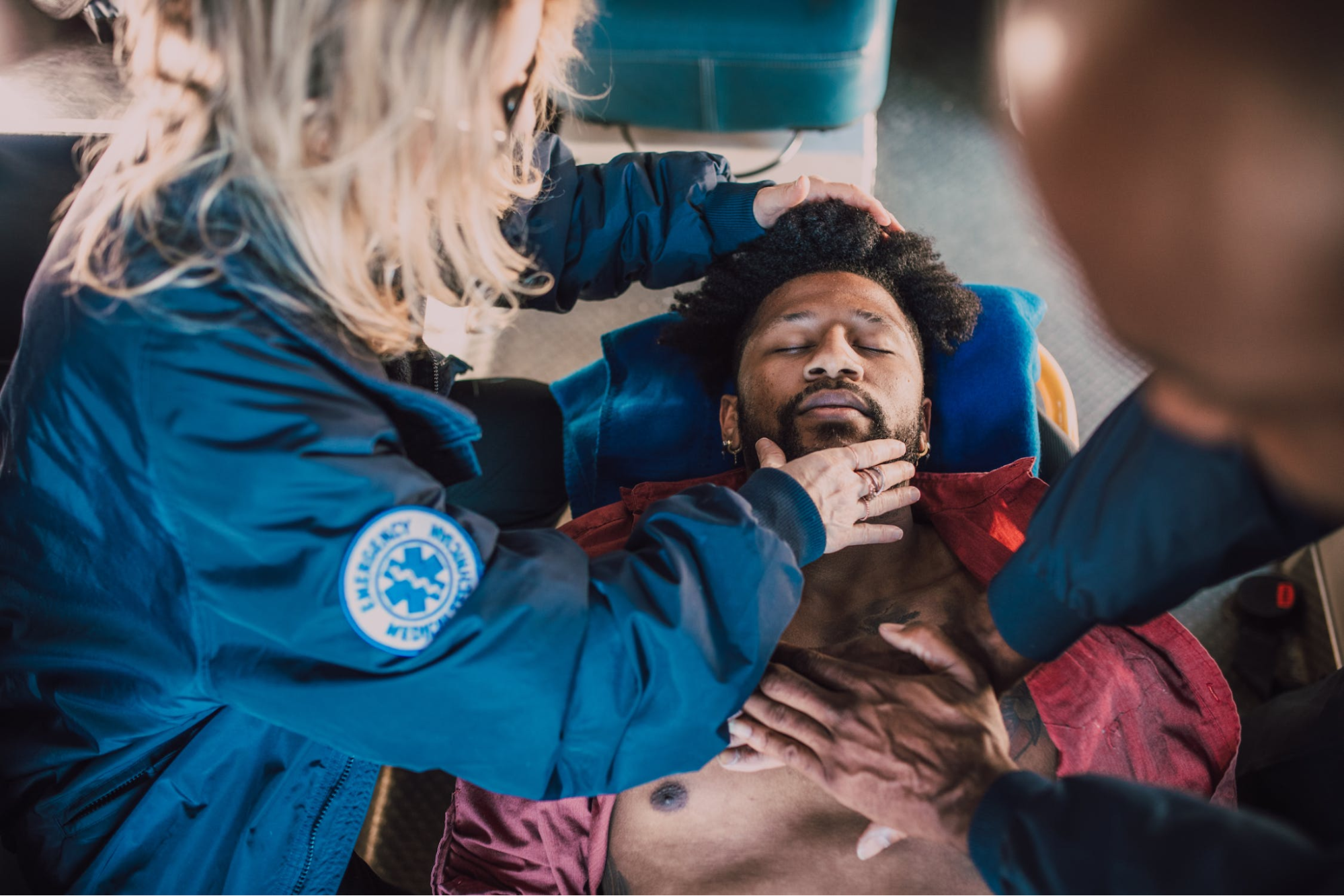 Healthcare personnel performing CPR