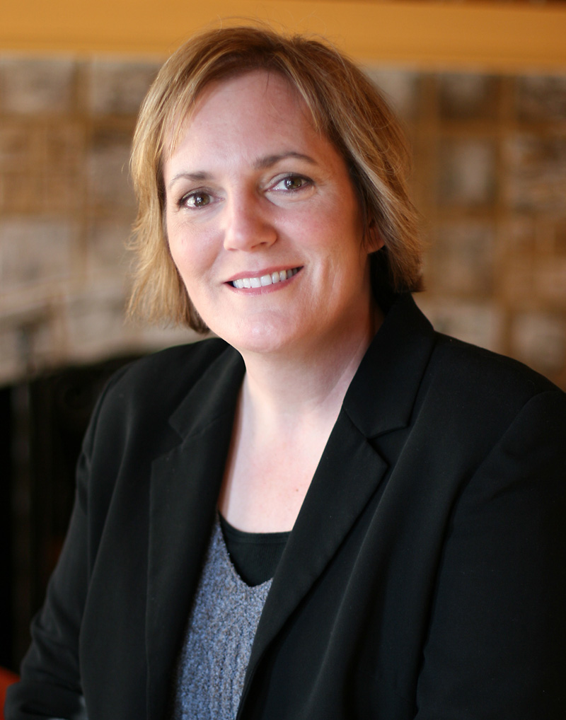 Professional portrait of Dr. Christine Malone smiling