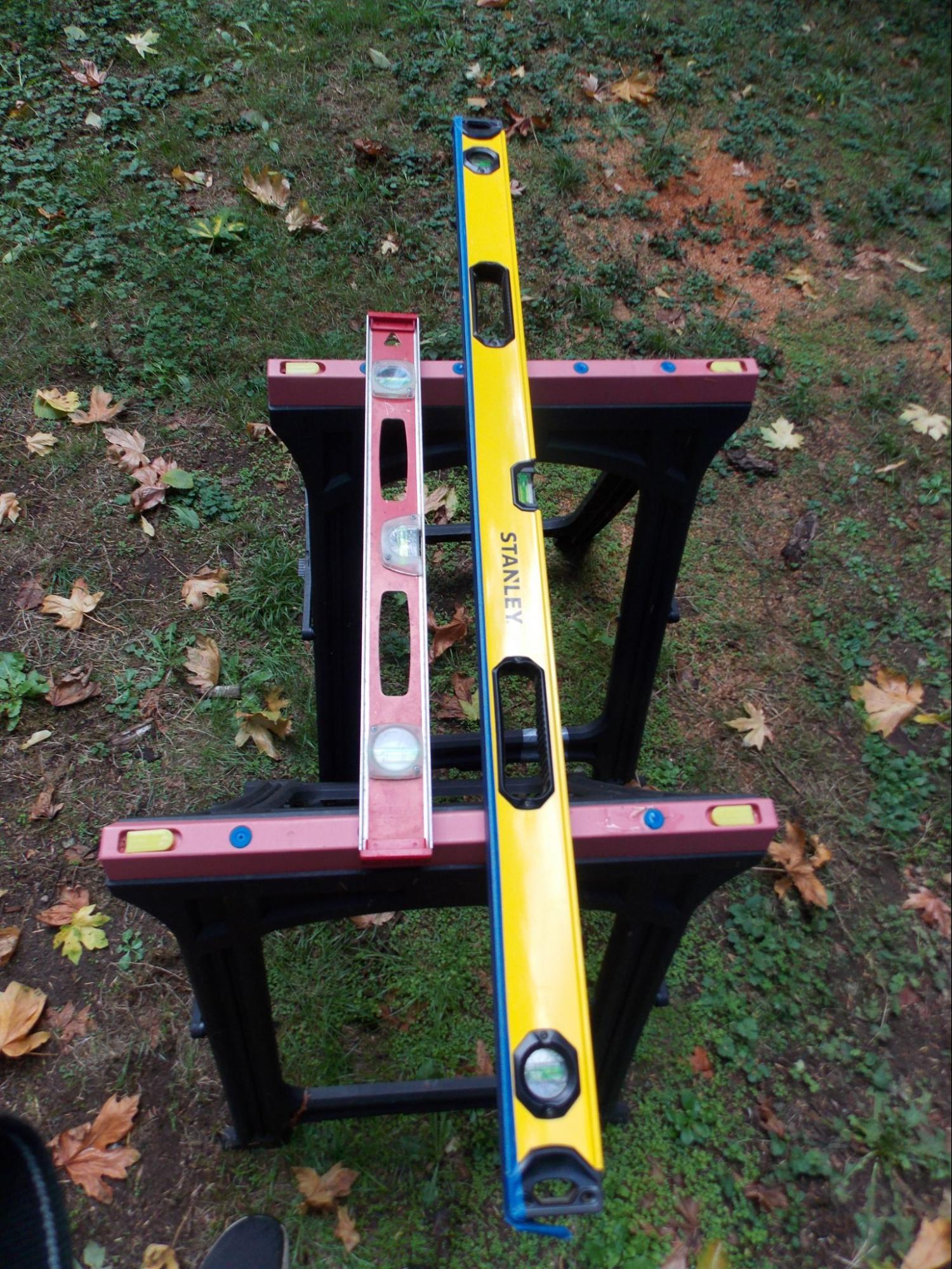 Two typical examples of a two-foot and four-foot level are pictured. The two-foot level is on the left and is red; the four-foot level is on the right and is yellow. The biggest difference in these levels when compared is length.