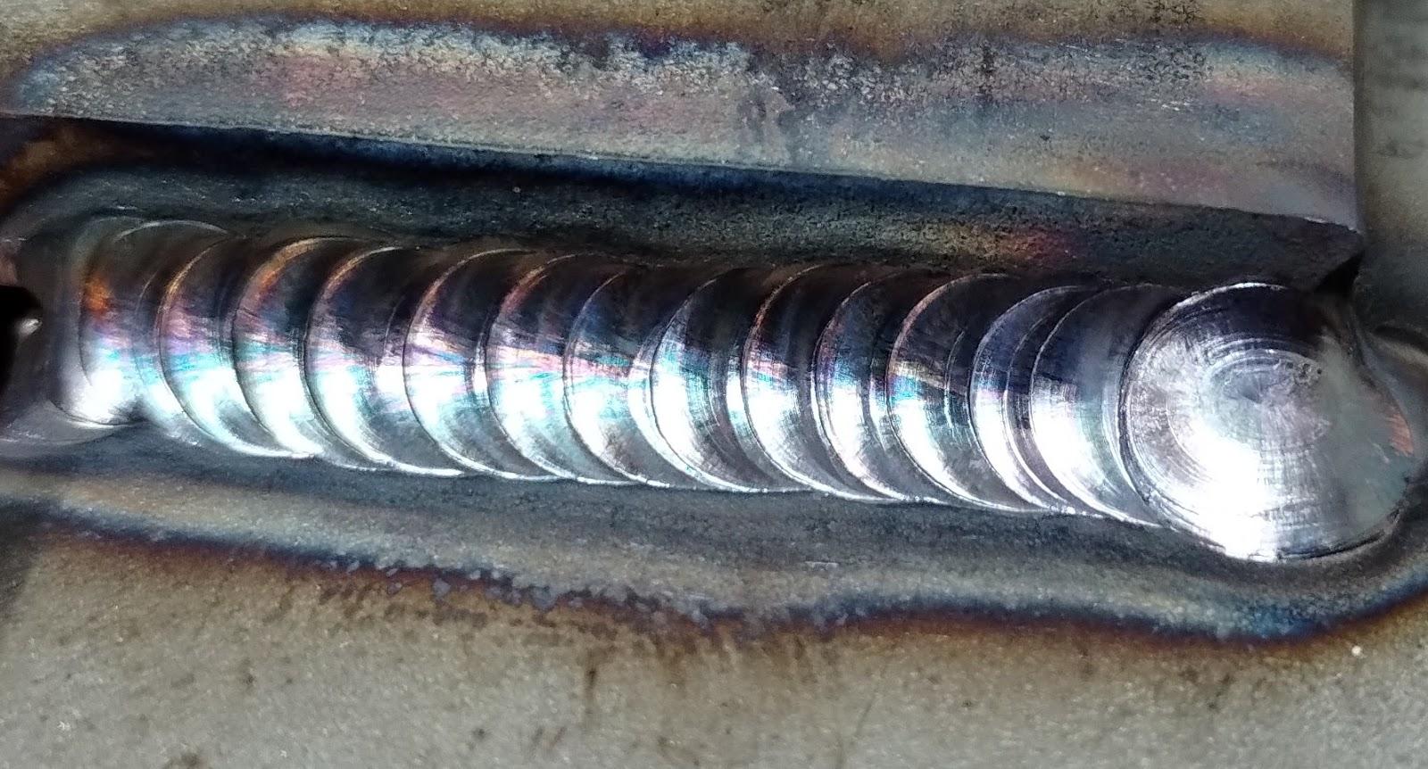 GTAW weld on stainless steel that has a gray-black color indicating that there is excessive heat input.