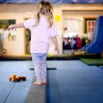 Child on a balance beam