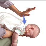 Positioning infant for back blow