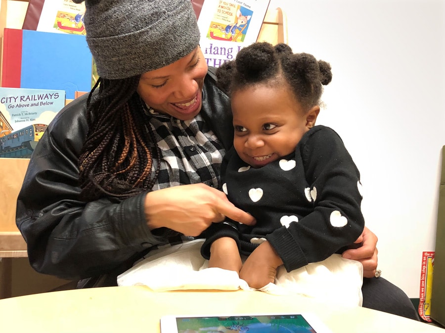 Teacher playing with child