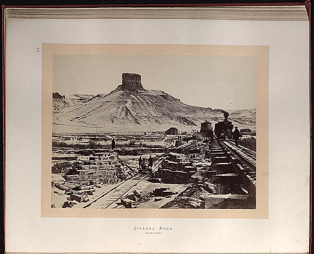 Black and white photograph shows the construction of the transcontinental railroad, circa 1869.