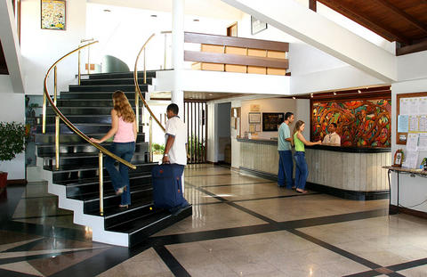 Guests checking into a hotel.