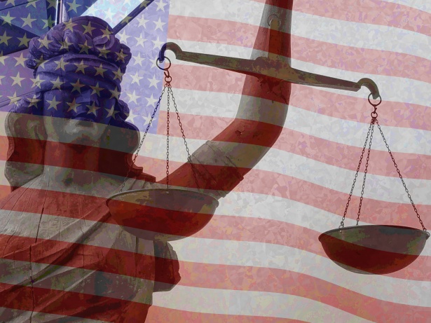 Illustration of the personification of Lady Justice holding the scales of justice against the background of a wavering American flag.