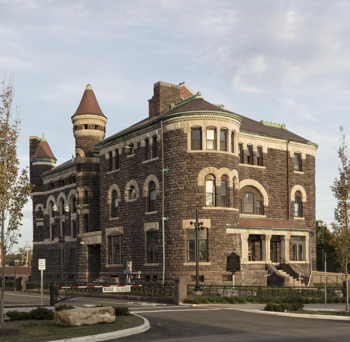 Photograph of the Richardsonian Romanesque-style pink sandstone building.