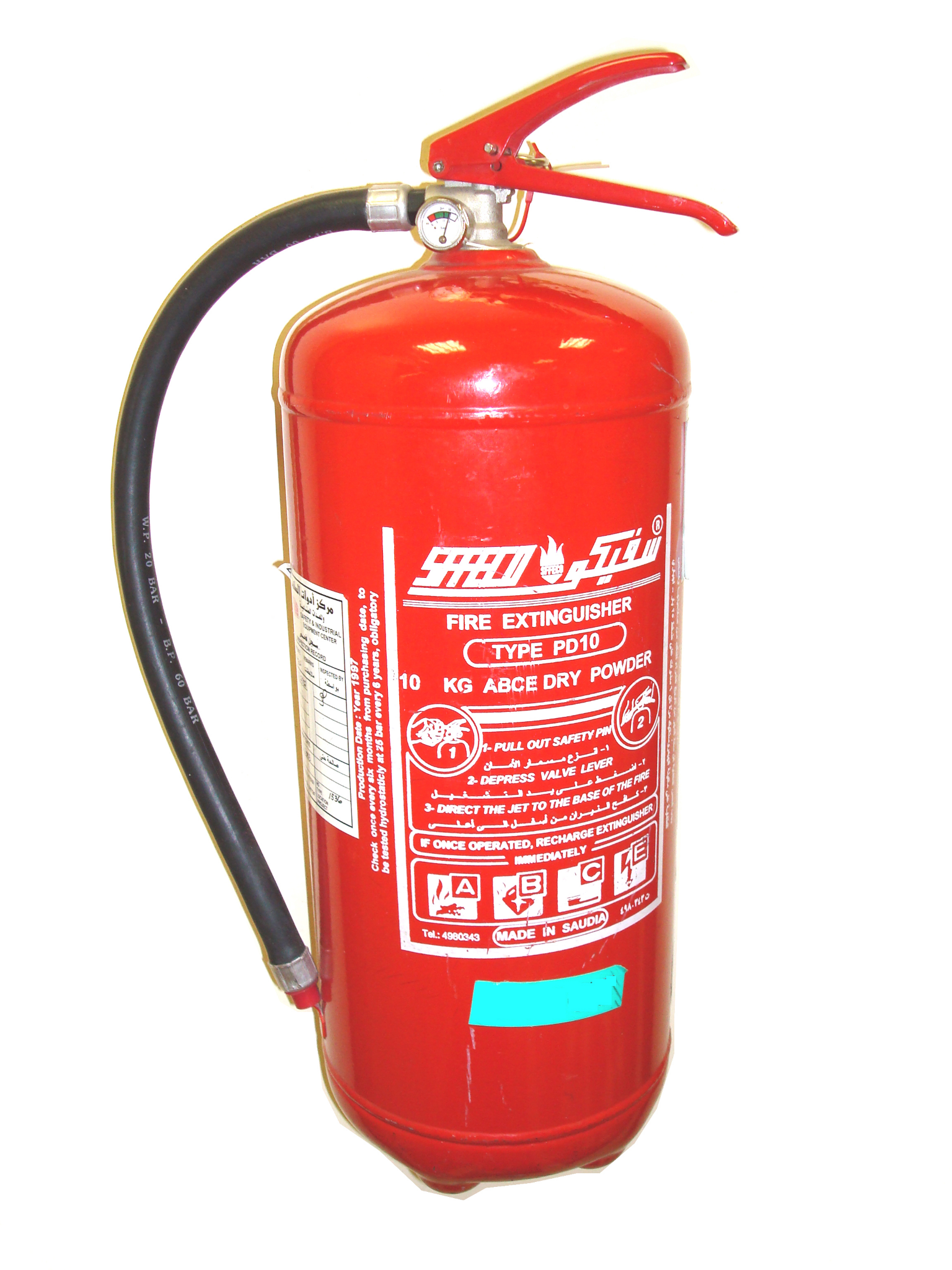 A red fire extinguisher with handle, hose and pressure gauge.