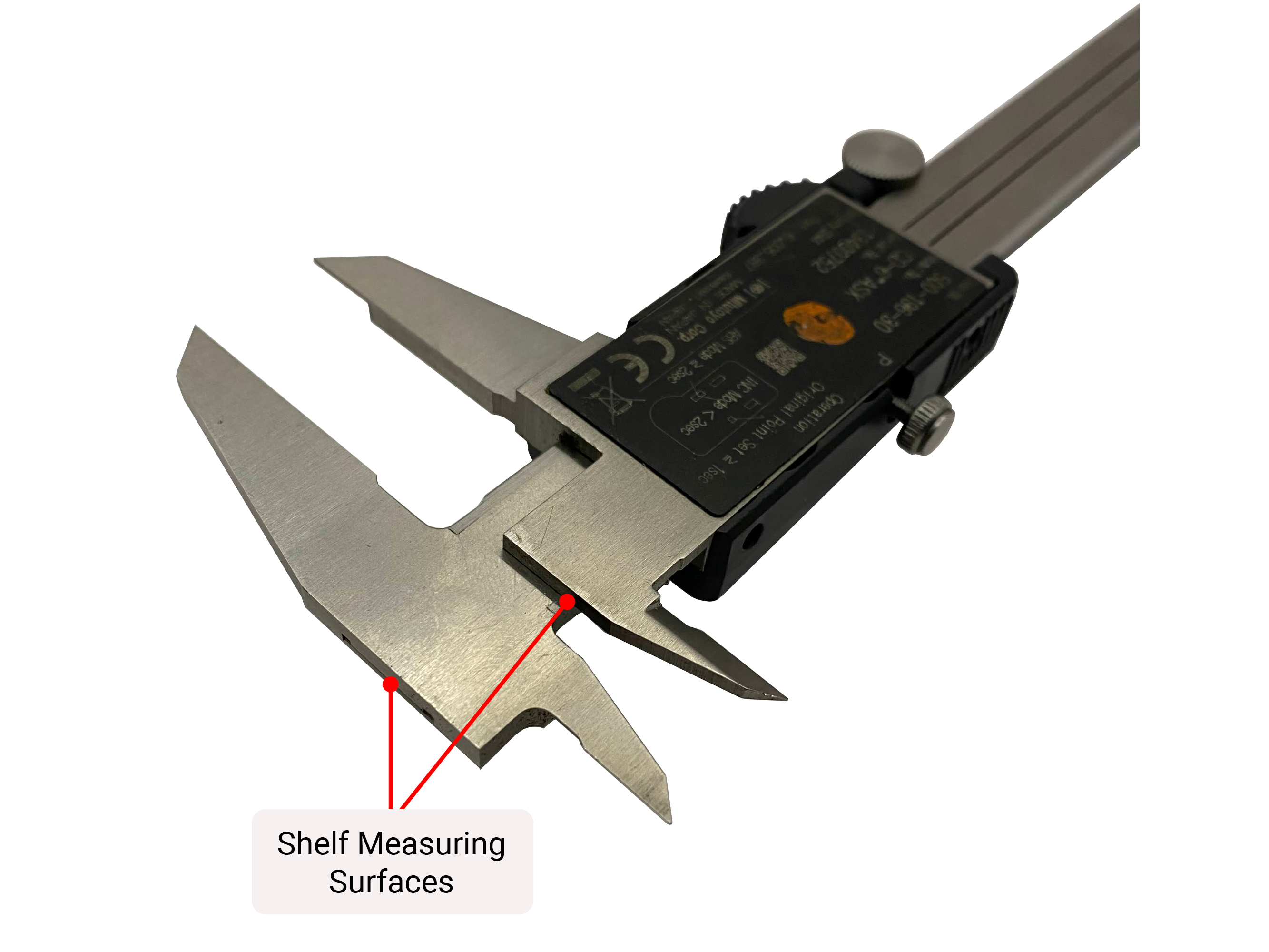 The flat surfaces on the back of the micrometer used for measuring depth are indicated with a label and arrows.