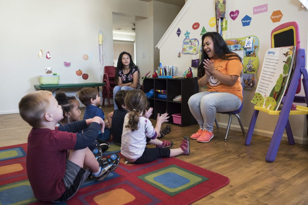 Talia Sustaita, Family Child Care (FCC) Program provider, sings songs with her children at Shaw Air Force Base, S.C., April 12, 2018.