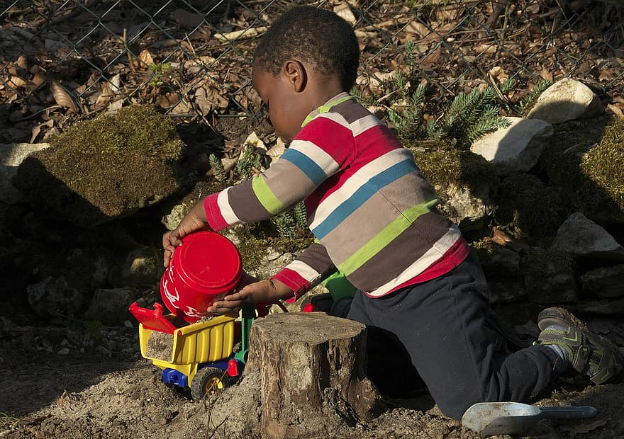 Child playing in the sand.