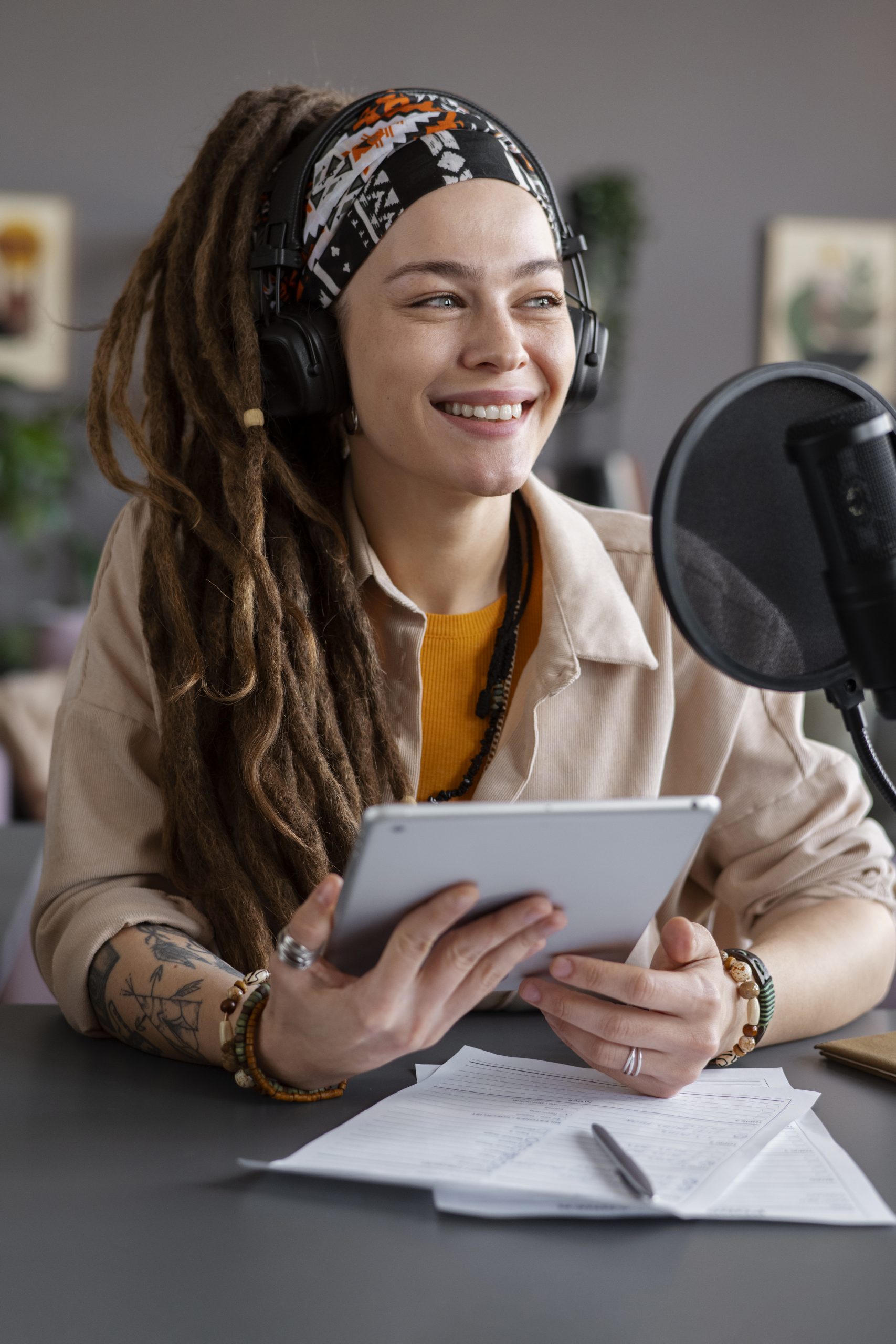 Happy woman making podcast medium shot