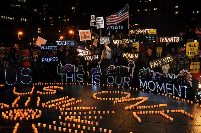 A colorful and lit up fast food strike protest