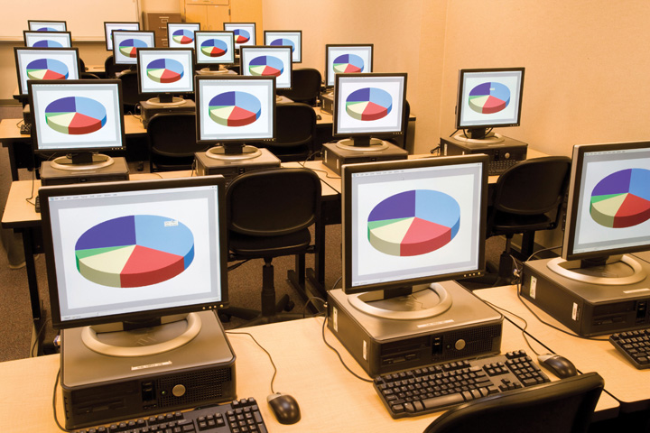 A room full of computers sharing the same screen