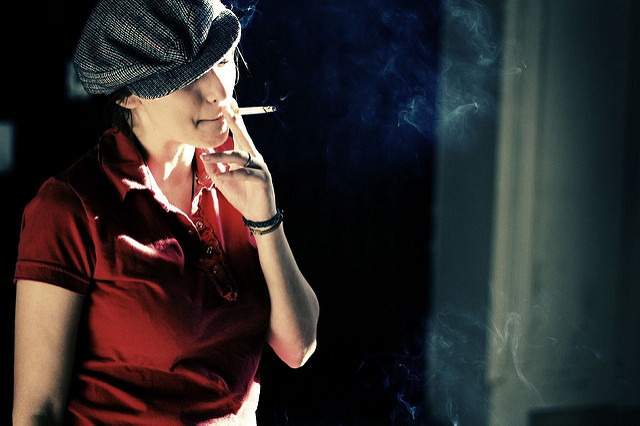 A woman smoking a cigarette