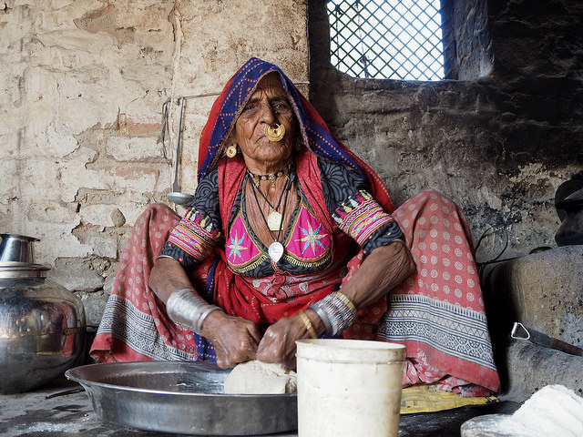 A Bishnoi grandmother washing clothes on the street