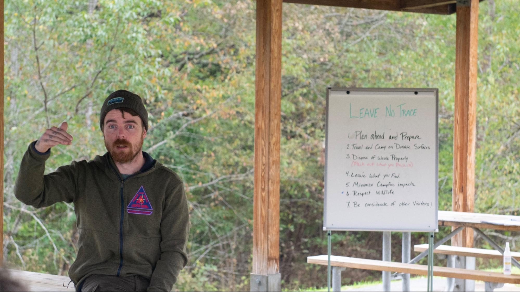 A park employee explaining the “Leave No Trace” principles.