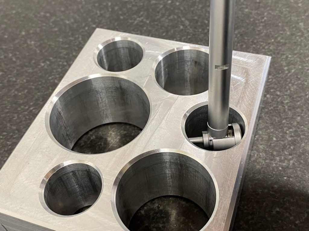 A bore gage inside of a bore.