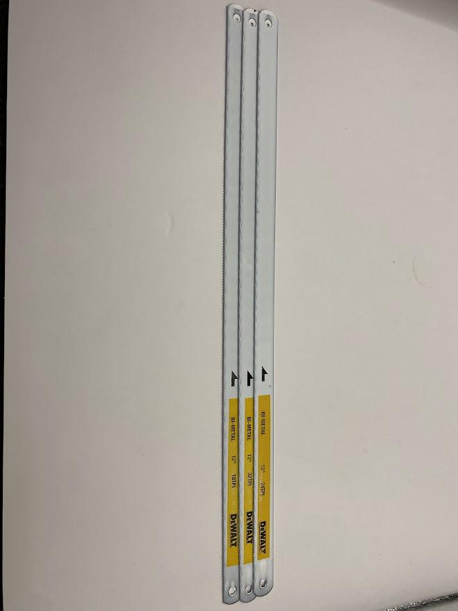 Three hacksaw blades displayed to show variety.