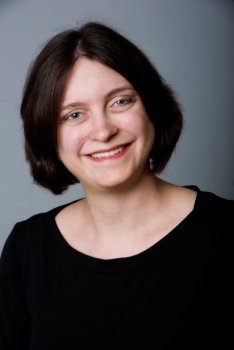 Professional portrait of Dr. Katie Baker smiling