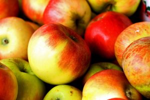 A pile of red and green apples.