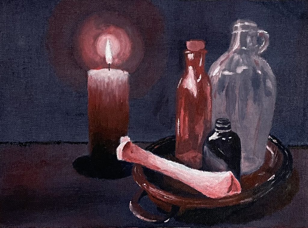 A bone, a black glass bottle, a corked brown glass bottle, and a large clear glass bottle sit in a brown metal bowl on a dark grey table against a desaturated blue/gray wall. The area is lighted by the flame of a candle next to the bowl.
