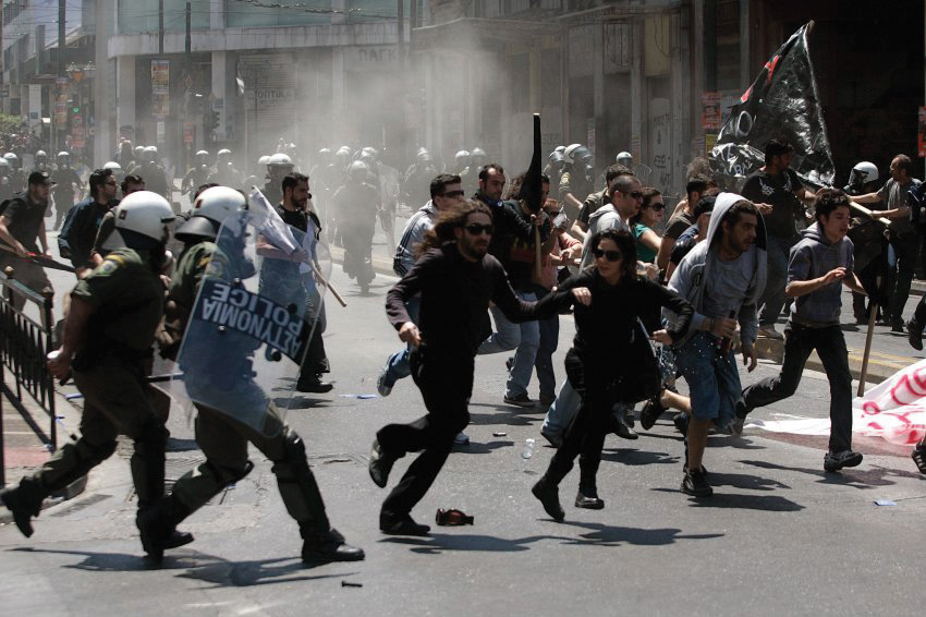 Greeks protests, and riot police trying to calm them down