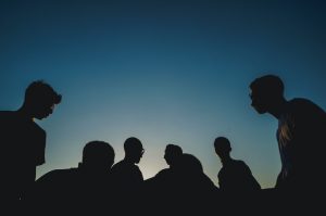 Photo of silhouette of group of people