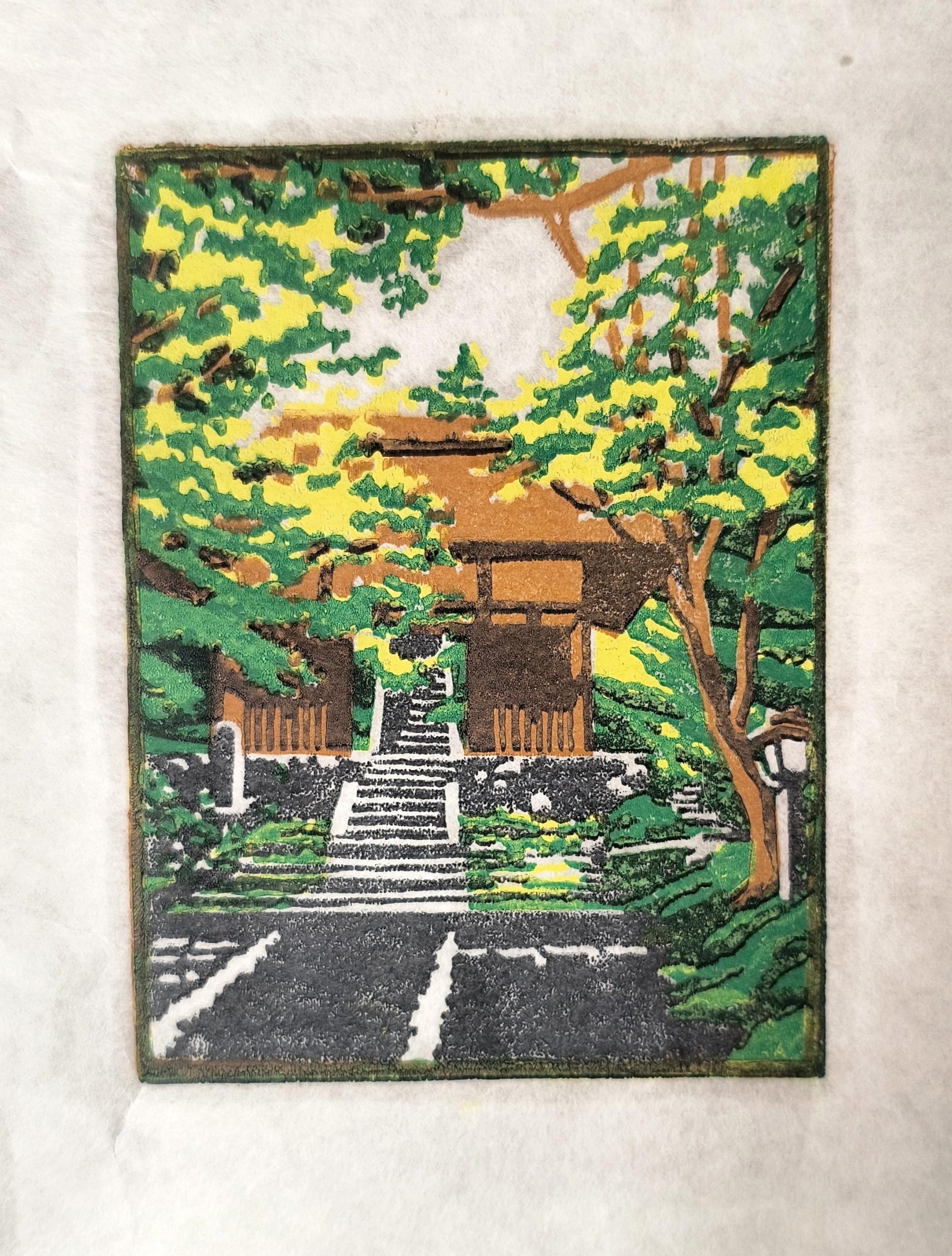 Patch art of a house surrounded by trees