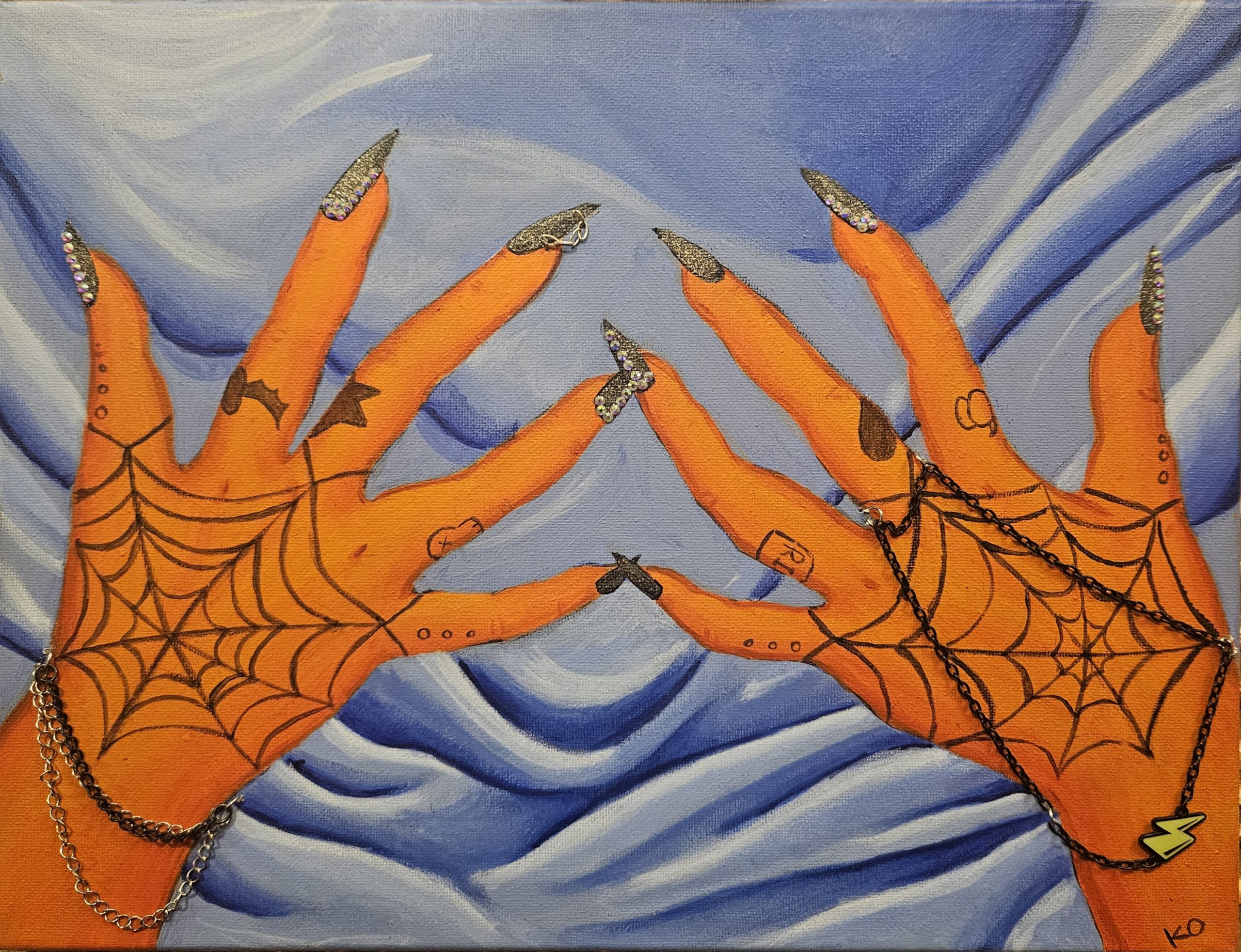 Artwork of hands with spiderweb and other tatoos with sparkling sharp nails and other decorations