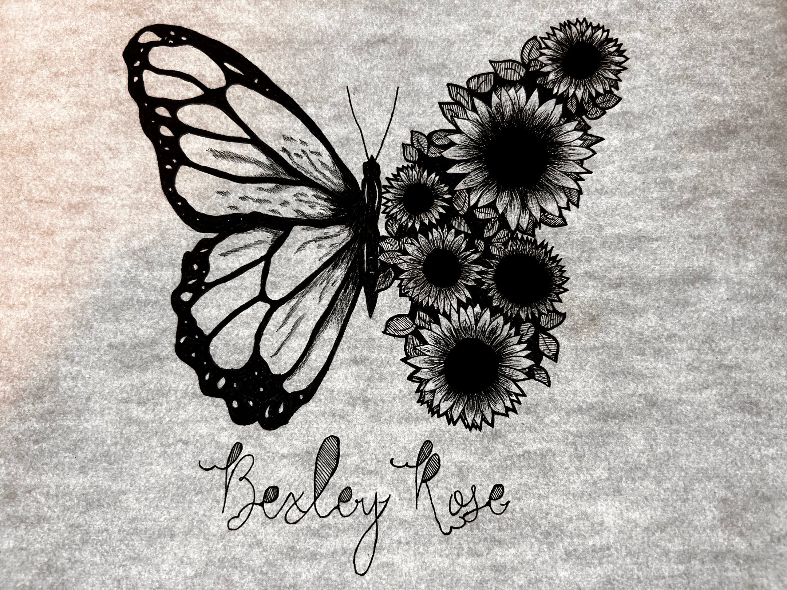 Black and white artwork of a butterfly with half its wings made of sunflowers