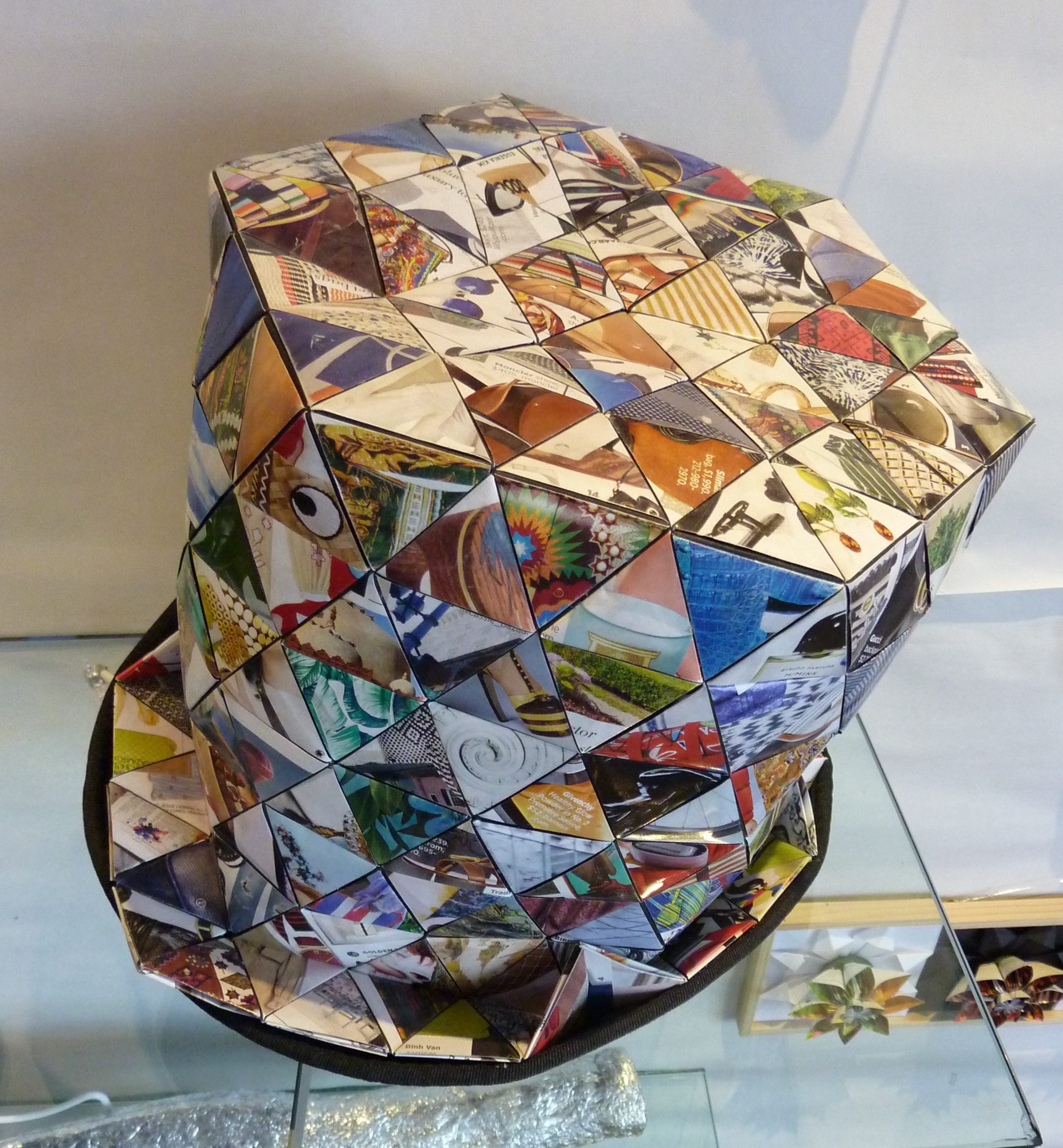 A top hat made from folded triangles of paper