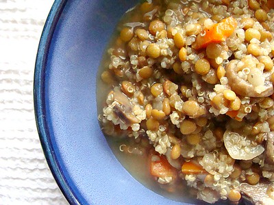 A bowl of lentils and quinoa.