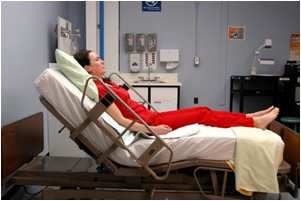 Photo of patient sitting at 30 degrees before receiving medications via tube
