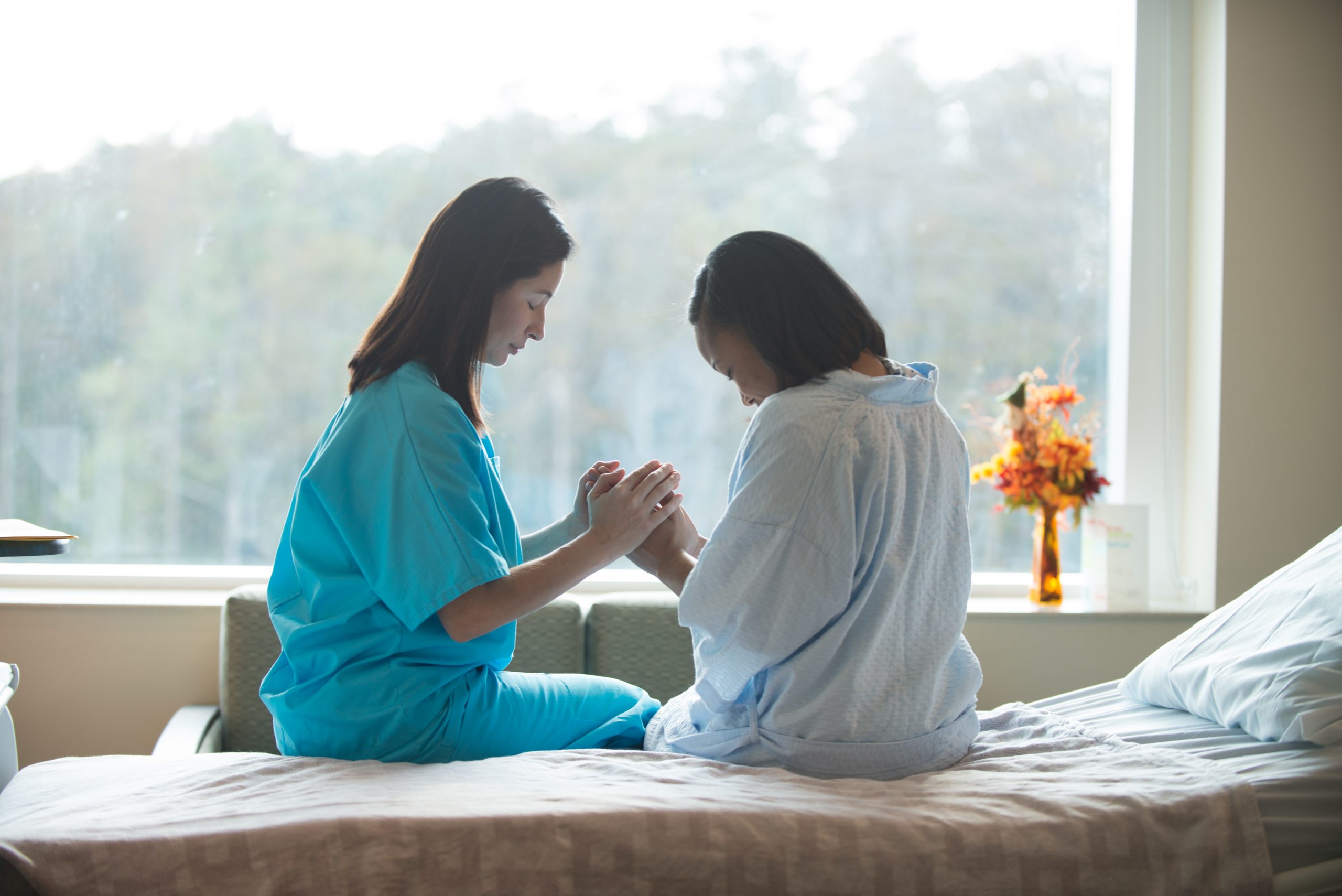 Image showing a Nurse Praying with a Patient