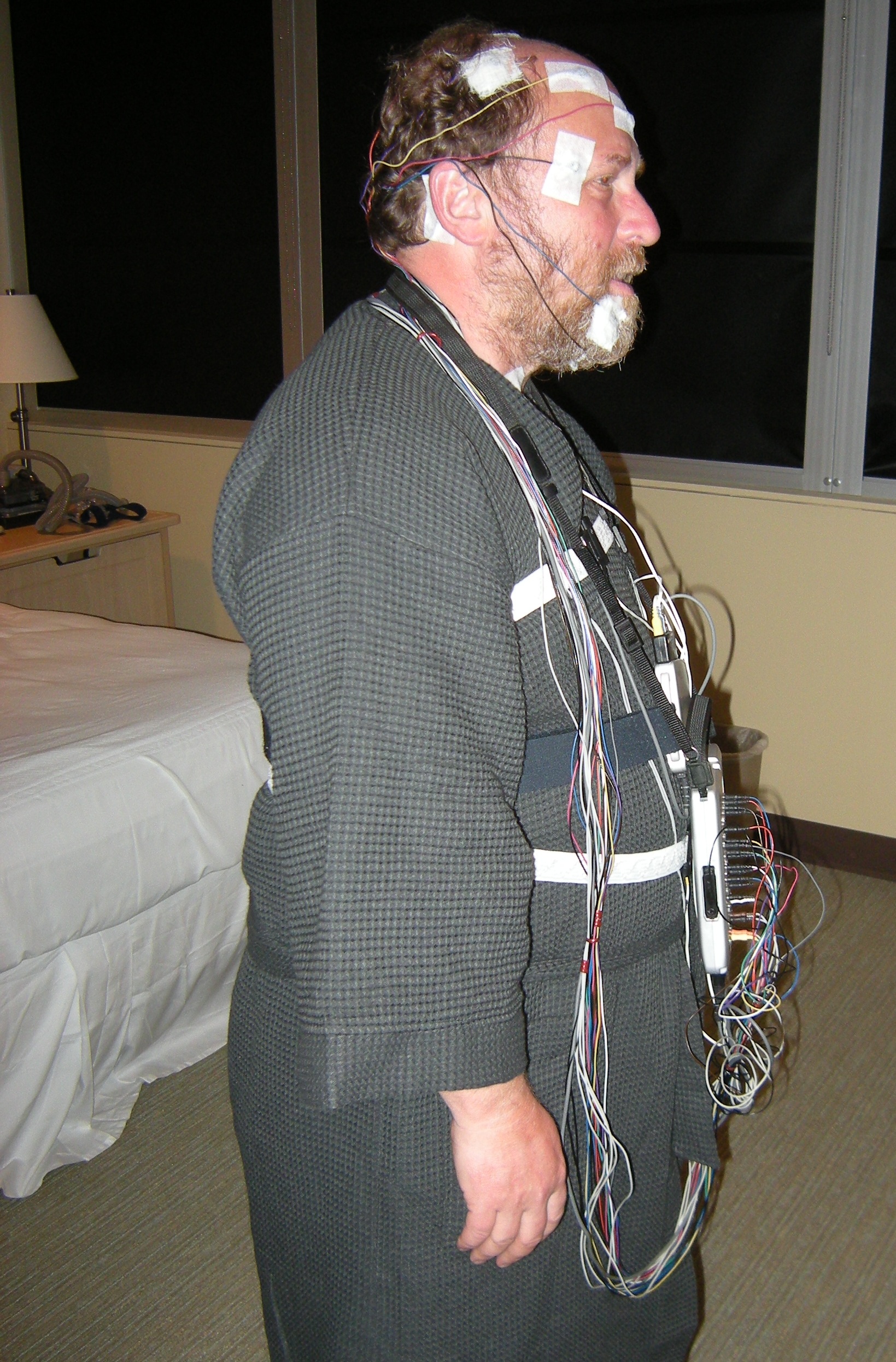 Image showing patient wired up for sleep study