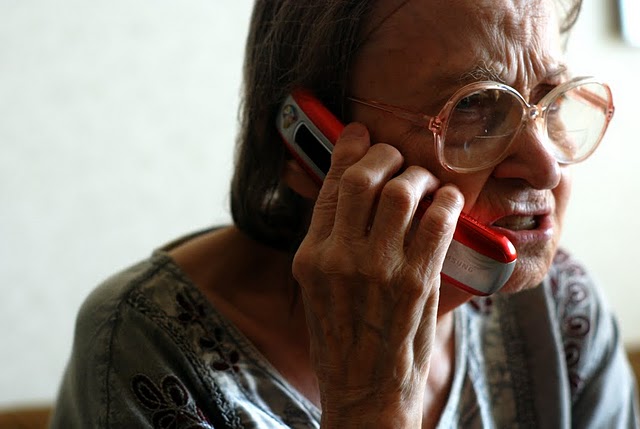 Image of elderly woman talking on a cell phone