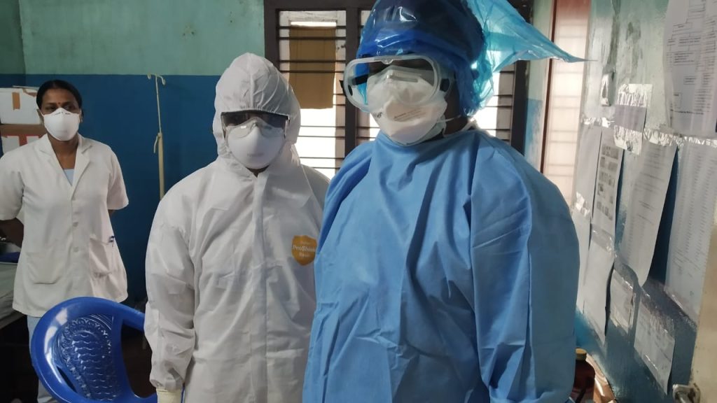 Photo showing medical staff wearing Personal Protective Equipment
