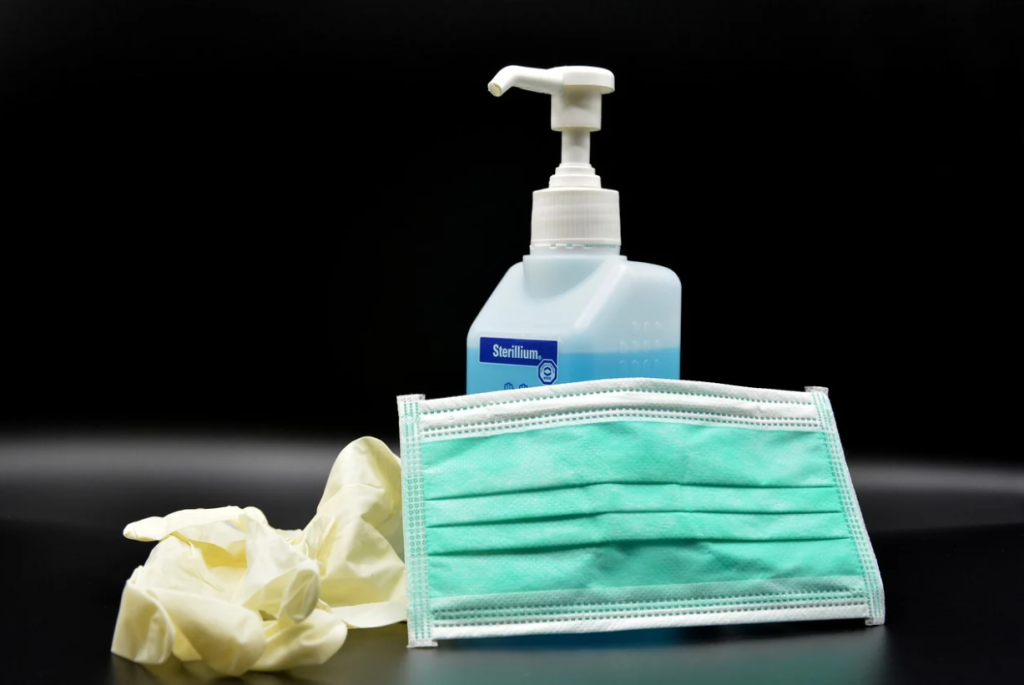 Image showing hand sanitizer, gloves, and a surgical mask