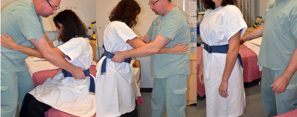 Image of nurse Assisting a simulated Patient to Stand