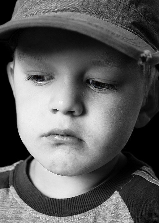 Image showing a sad faced child