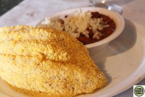 fried catfish, red beans, and rice