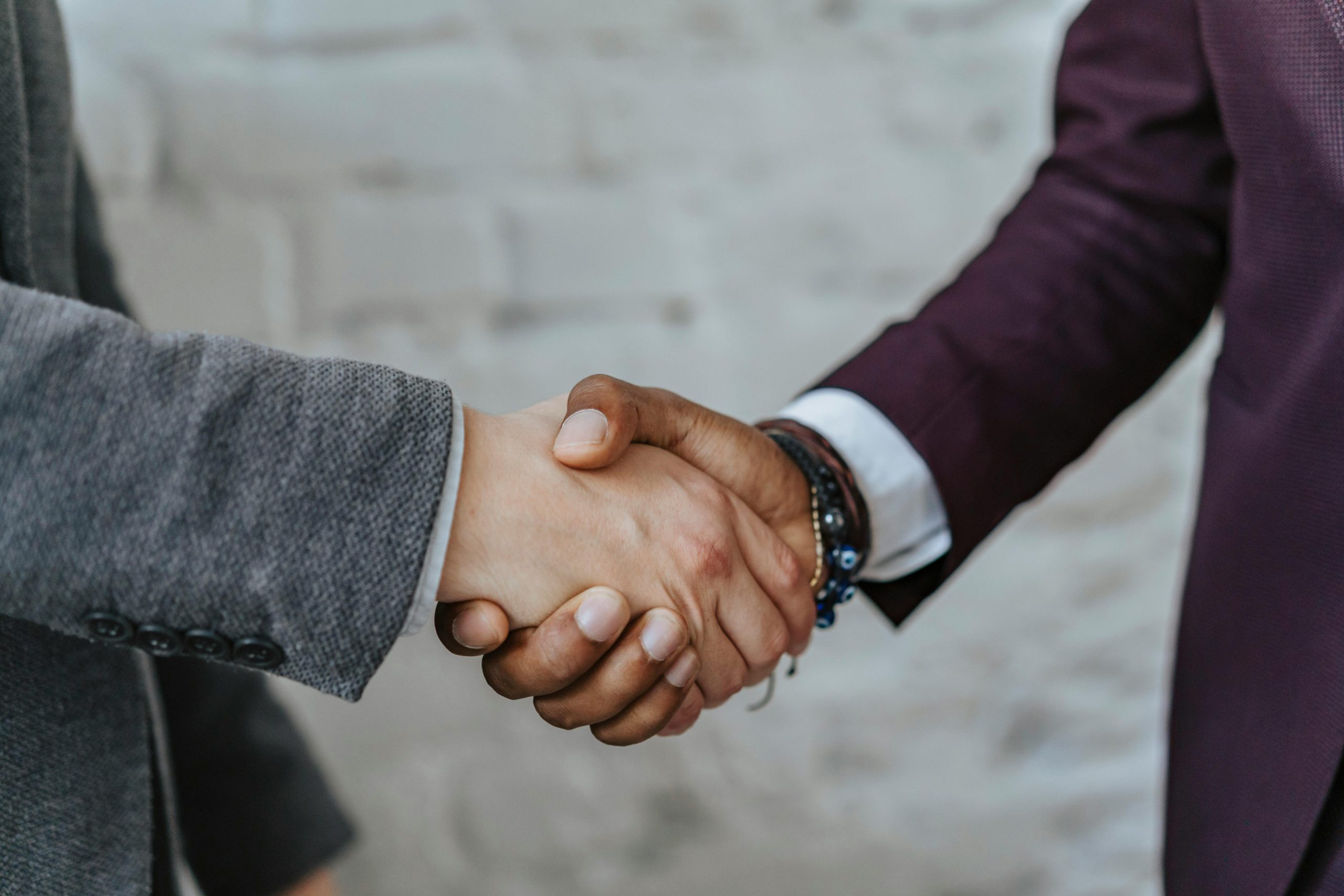 two people shaking hands